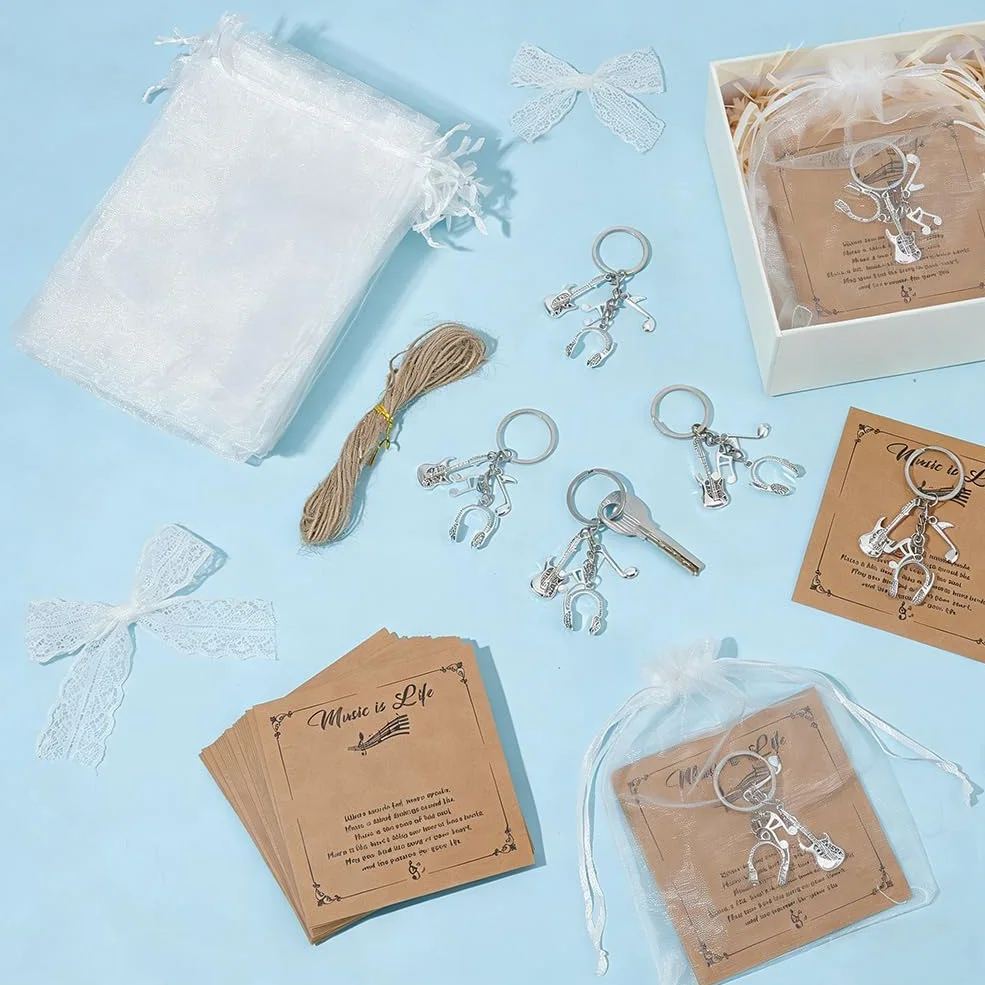 OLYCRAFT 24 Set Portachiavi a Tema Musicale con Chitarra Cuffie Note Musicali Portachiavi con Ciondoli Strumenti Musicali con Card Bustina in Organza per Musicisti Coro Decorazioni per Feste in Casa