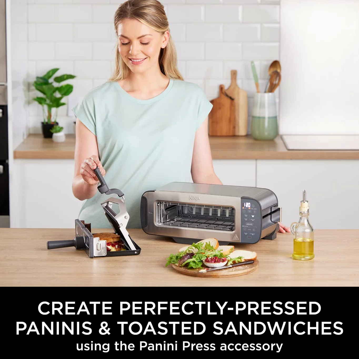 Ninja Foodi ST202UK ST202UK - Tostapane 3 in 1 con design a ribalta, 7 funzioni di cottura, 7 tonalità di toast, include pressa per panini, vassoio da forno e vassoio per briciole, in acciaio inox